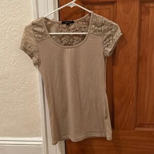 Tan top with less, short sleeve